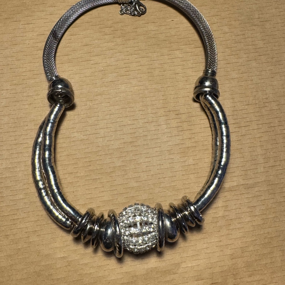 Silver Horseshoe Necklace with Ornate Centerpiece